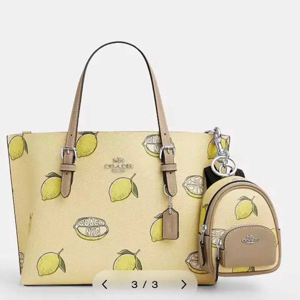 NWT It’s a bag charm Coach Charm With Lemon Print CAP03
